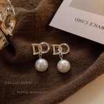 Famous Brand Golden Alloy Pearl Pendant Drop Earrings - Image 5
